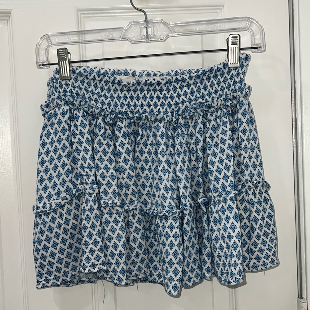 White and blue flowy patterned skirt
